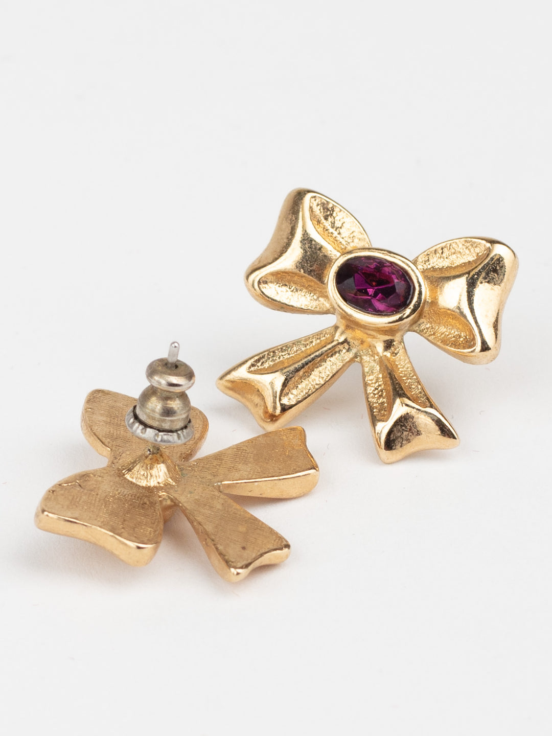 Vintage 80s Bow Earrings with Purple Glass Stone Center