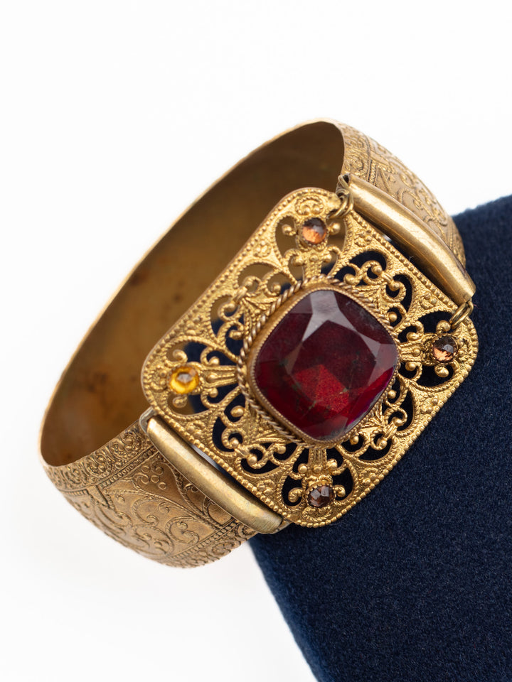 Antique 1890s Brass Cuff Bracelet with Red Glass Stone and Filigree Setting