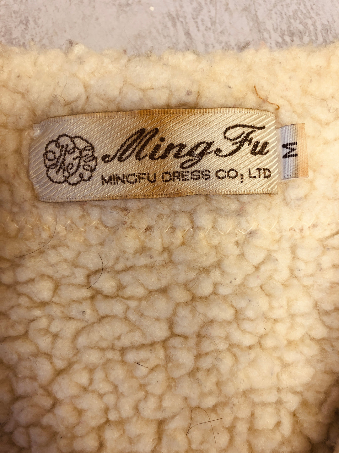 Vintage 90's Women Faux Sheepskin Coat in Light Brown - NorthernGrip