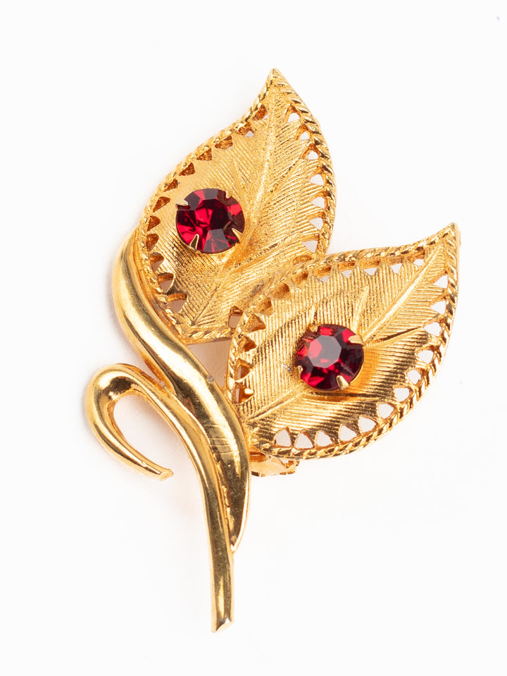 Vintage 80s Celebrity Gold-Tone Leaf Brooch with Red Rhinestones