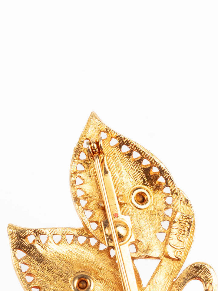 Vintage 80s Celebrity Gold-Tone Leaf Brooch with Red Rhinestones