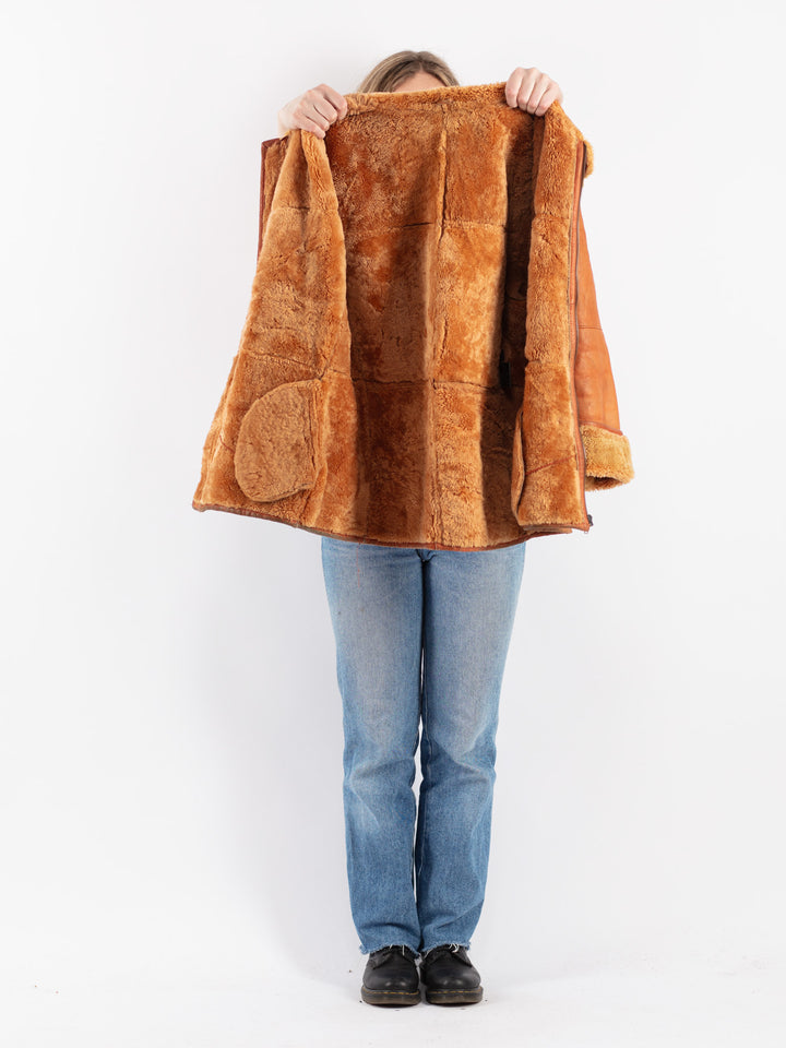 Vintage 90's Women Sheepskin Coat in Orange