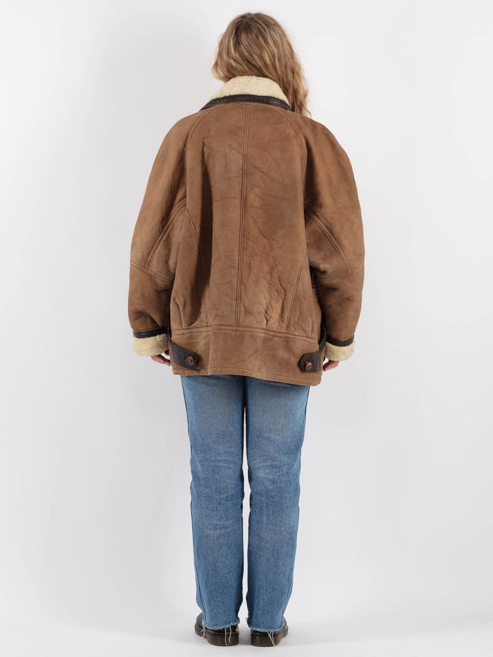 Vintage 80's Women Sheepskin Shearling Coat in Beige - NorthernGrip