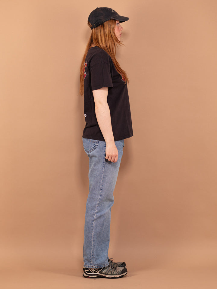 Vintage 90's Women T-shirt with AC/DC print - NorthernGrip