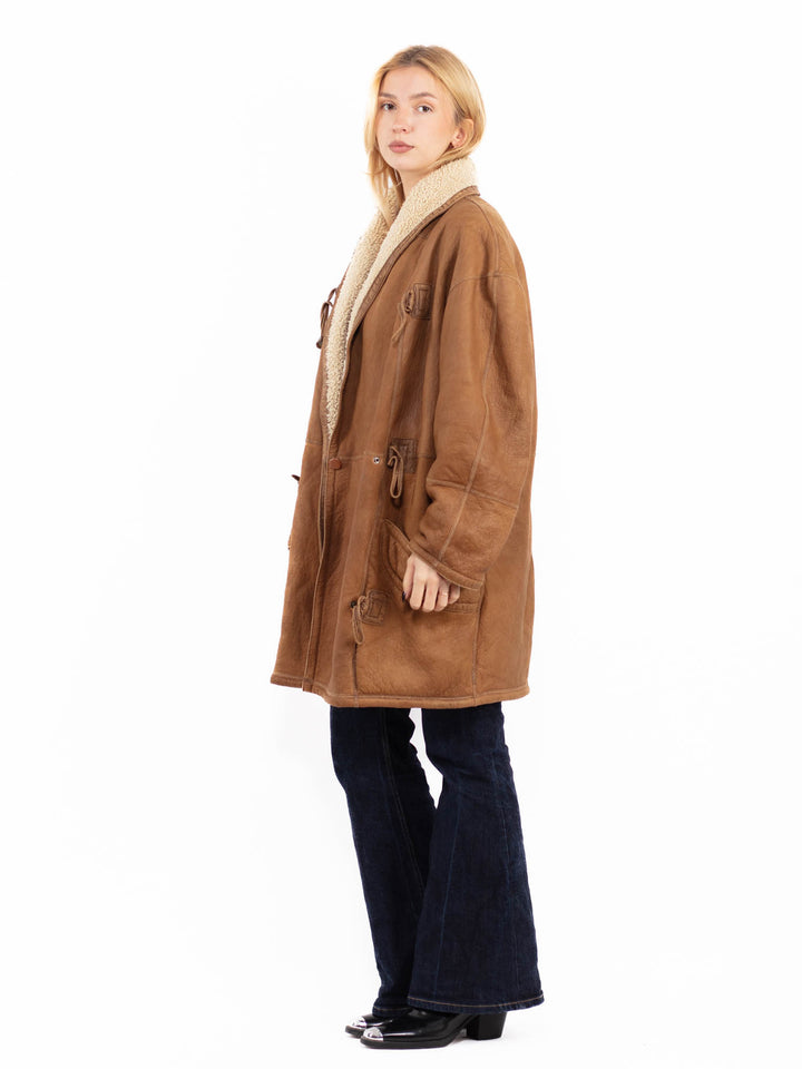 Vintage 90's Women Oversized Sheepskin Coat in Brown