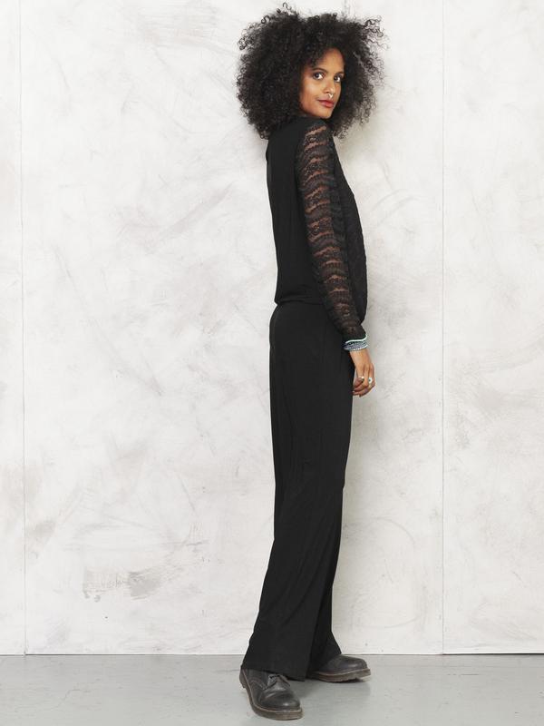 Model is wearing y2k black jumpsuit size L